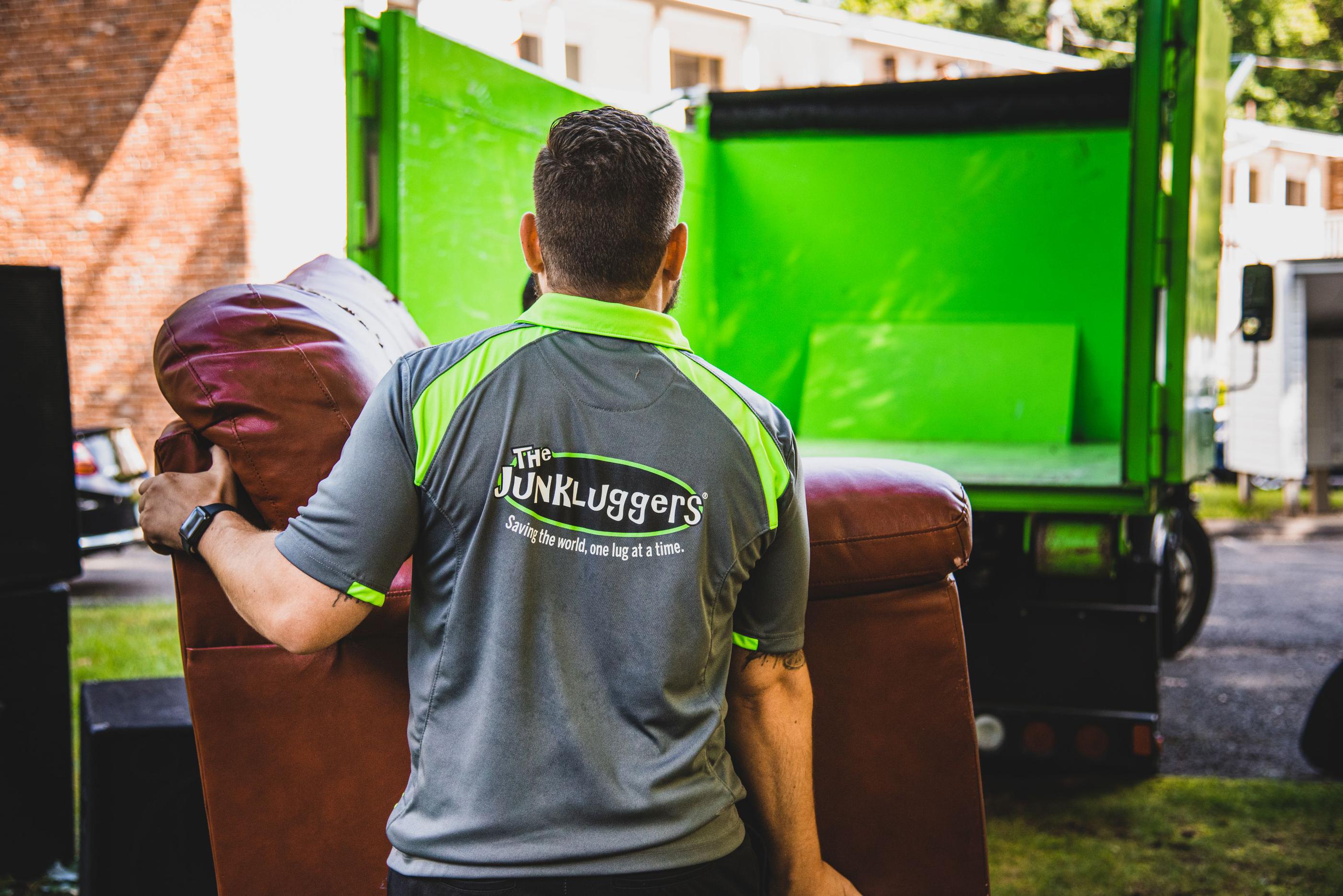 Junk Luggers team removing a couch.