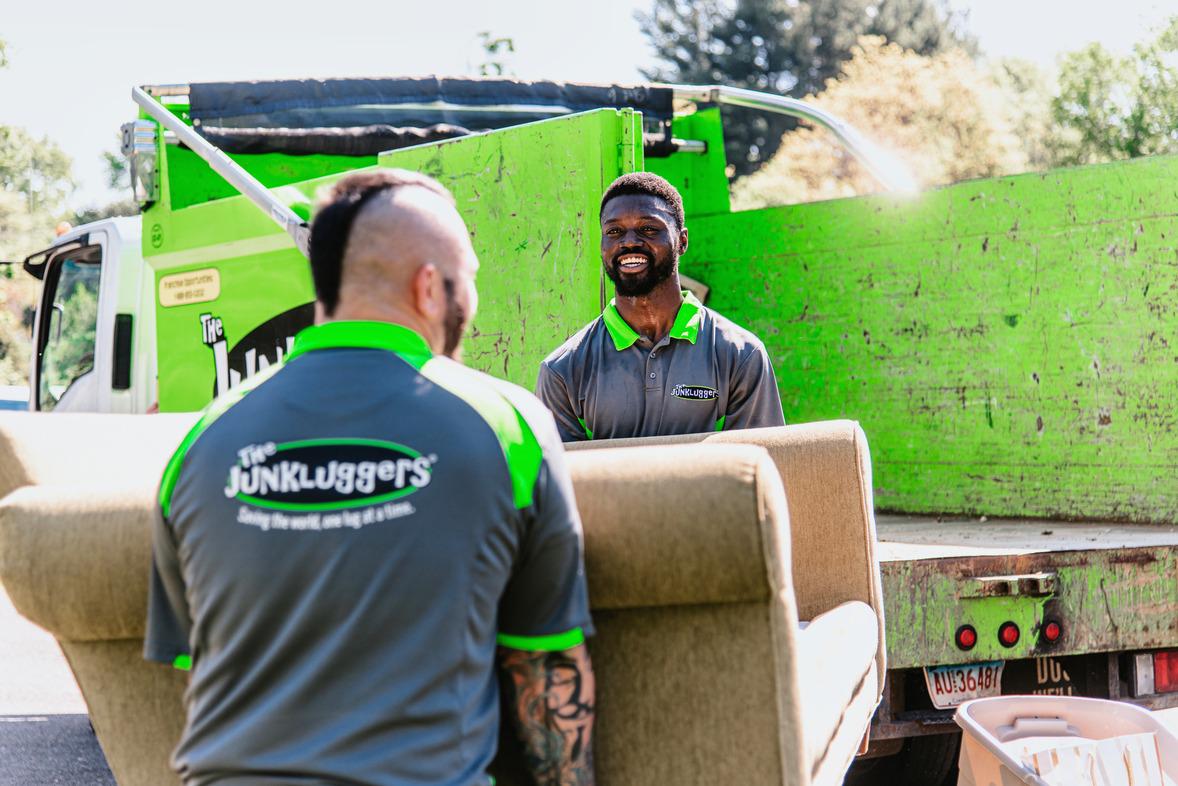 Junk Luggers team removing a couch.